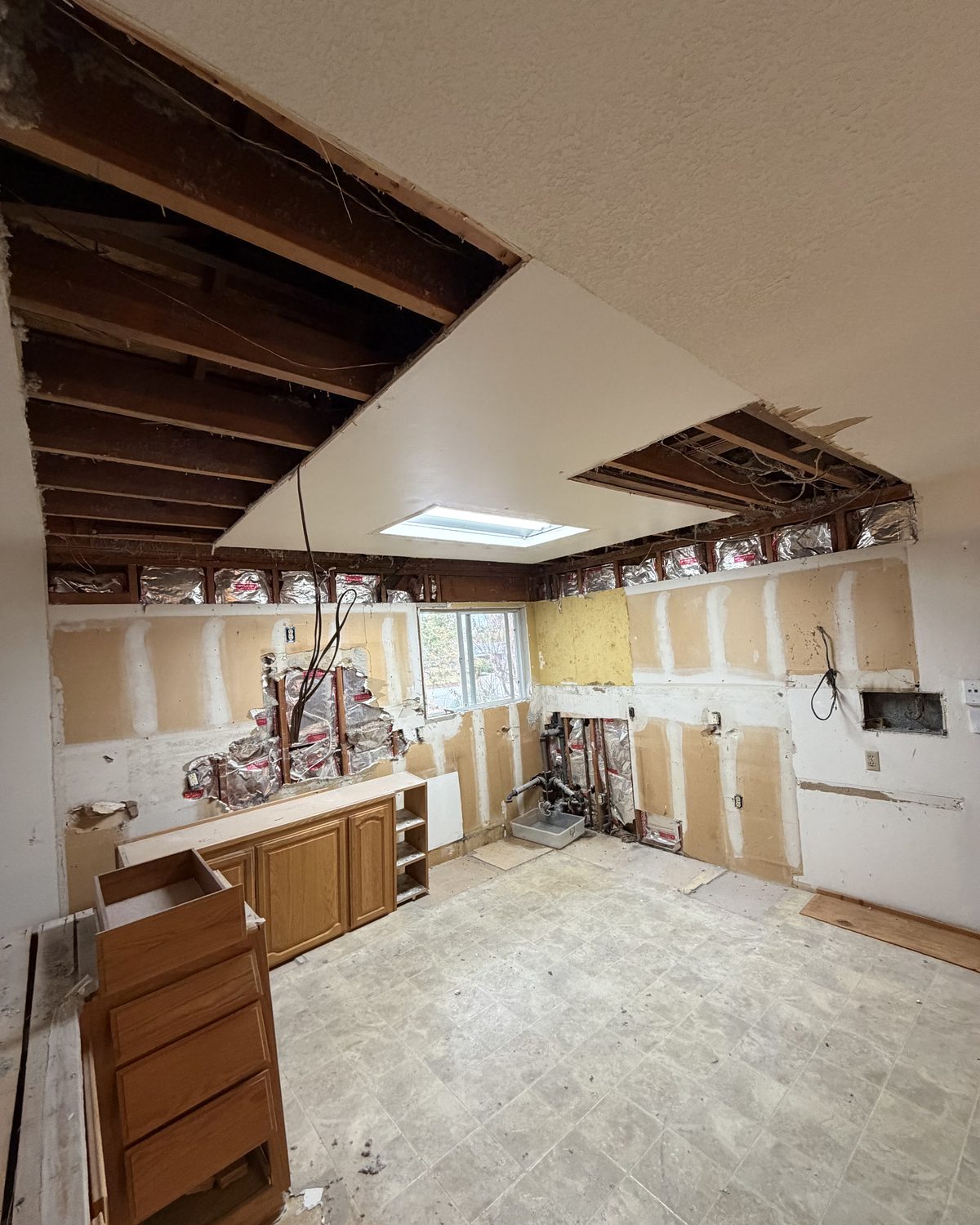 The same kitchen during demolition